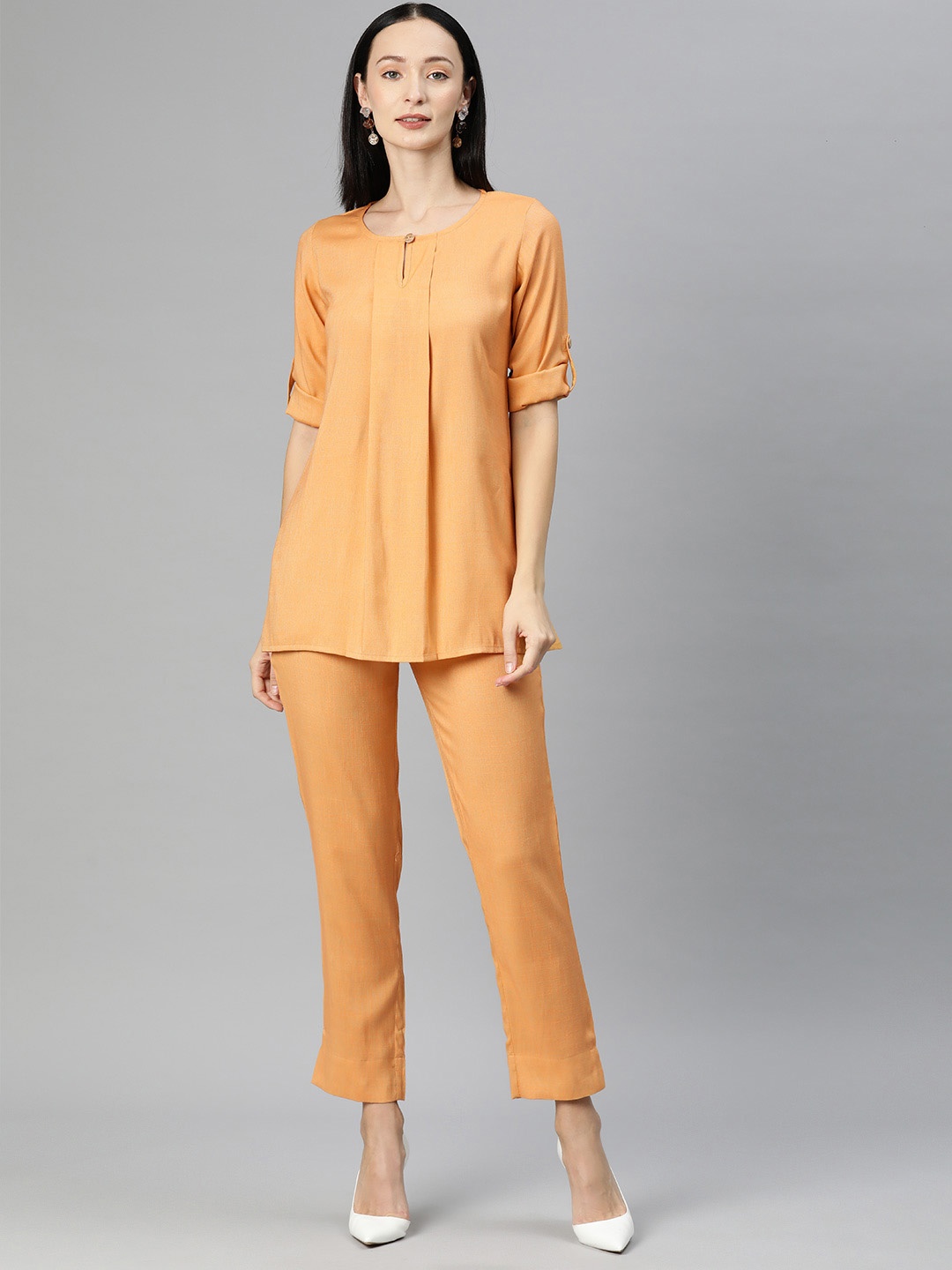 

Cottinfab Women Solid Top with Trousers, Yellow