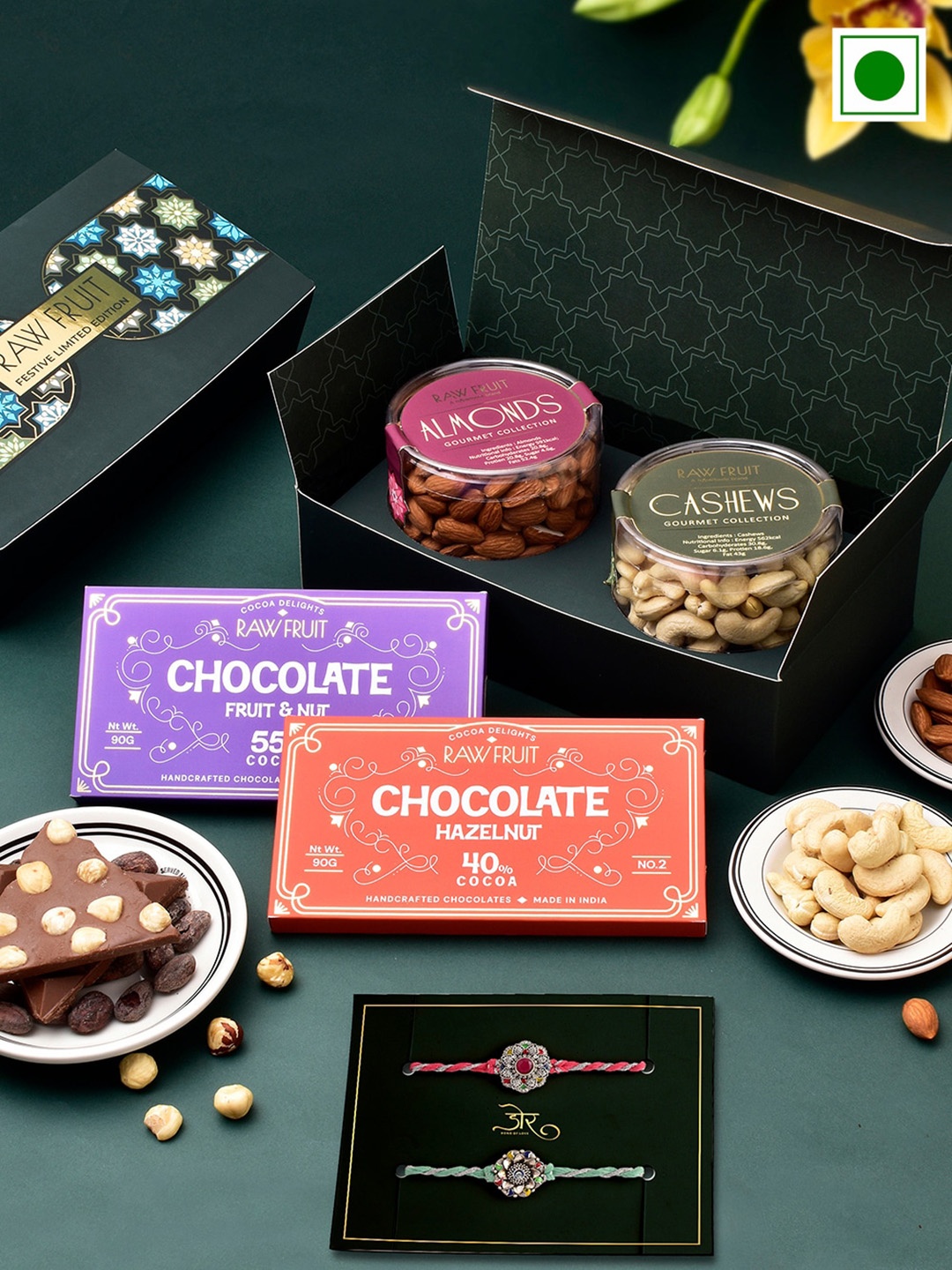 

RawFruit Choco and Nut Extravaganza With 2 Rakhis, Red