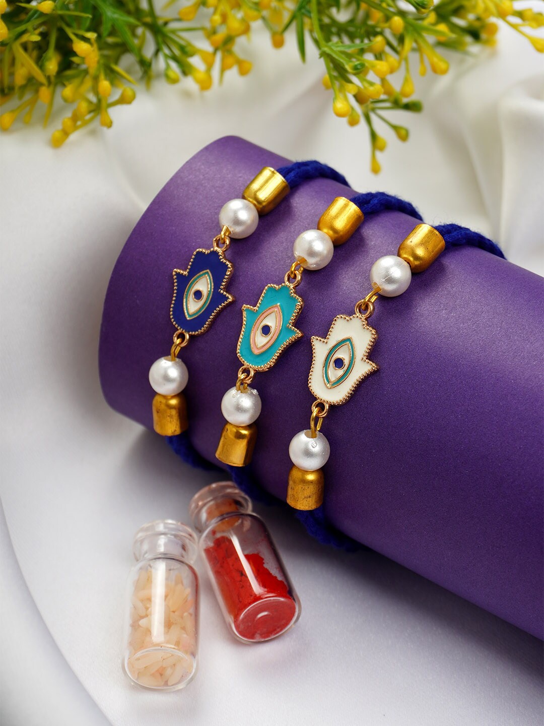 

Ferosh Set Of 3 Evil Eye Hamsa Rakhis With Roli Chawal, Gold