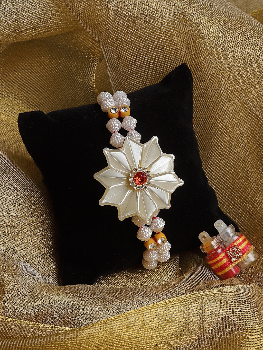 

PANASH Gold-Plated Stone-Studded & Beaded Rakhi With Roli Chawal