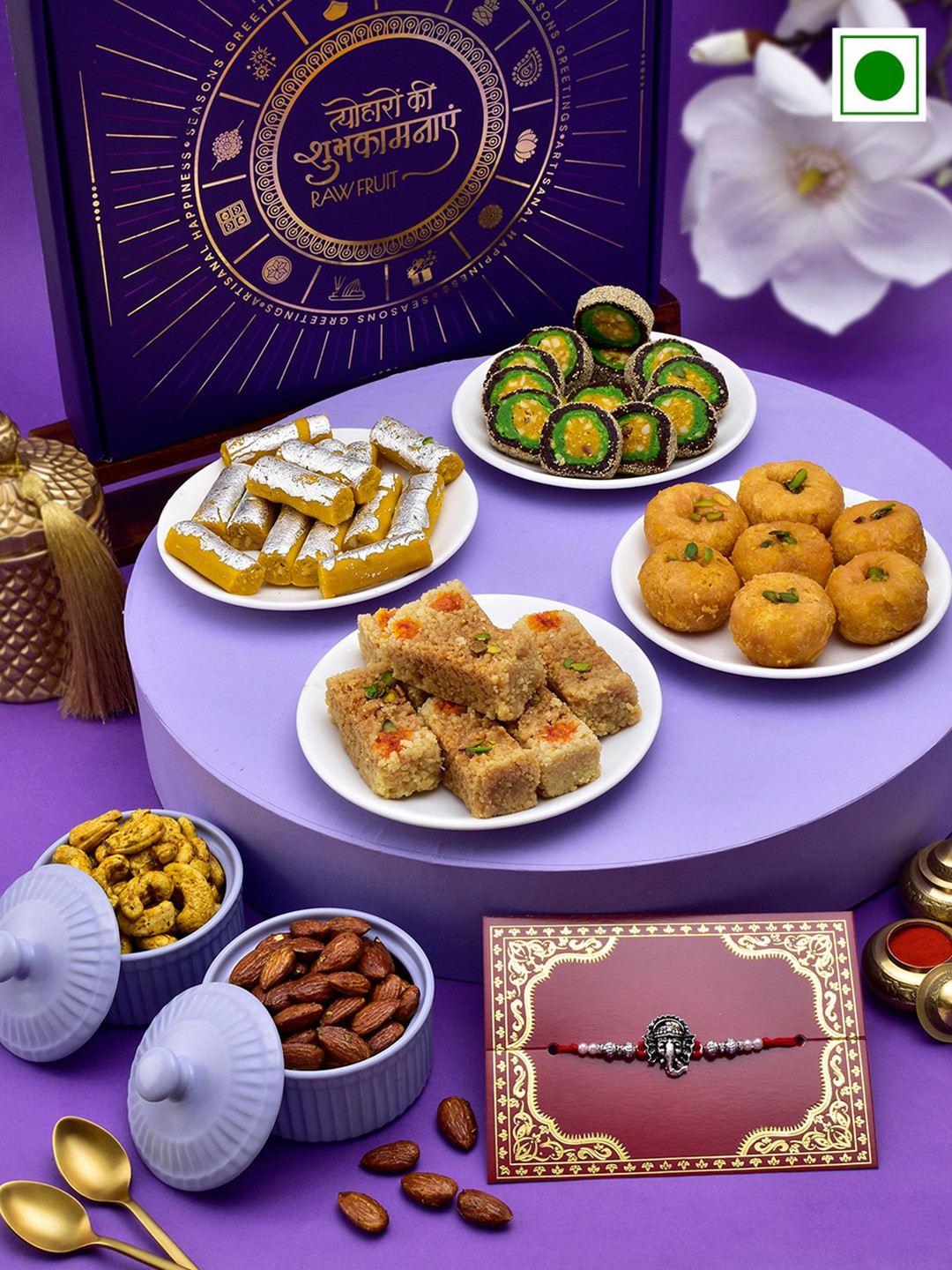 

RawFruit Ganesha Charm Rakhi With Sweets & Nuts Gift Set, Silver