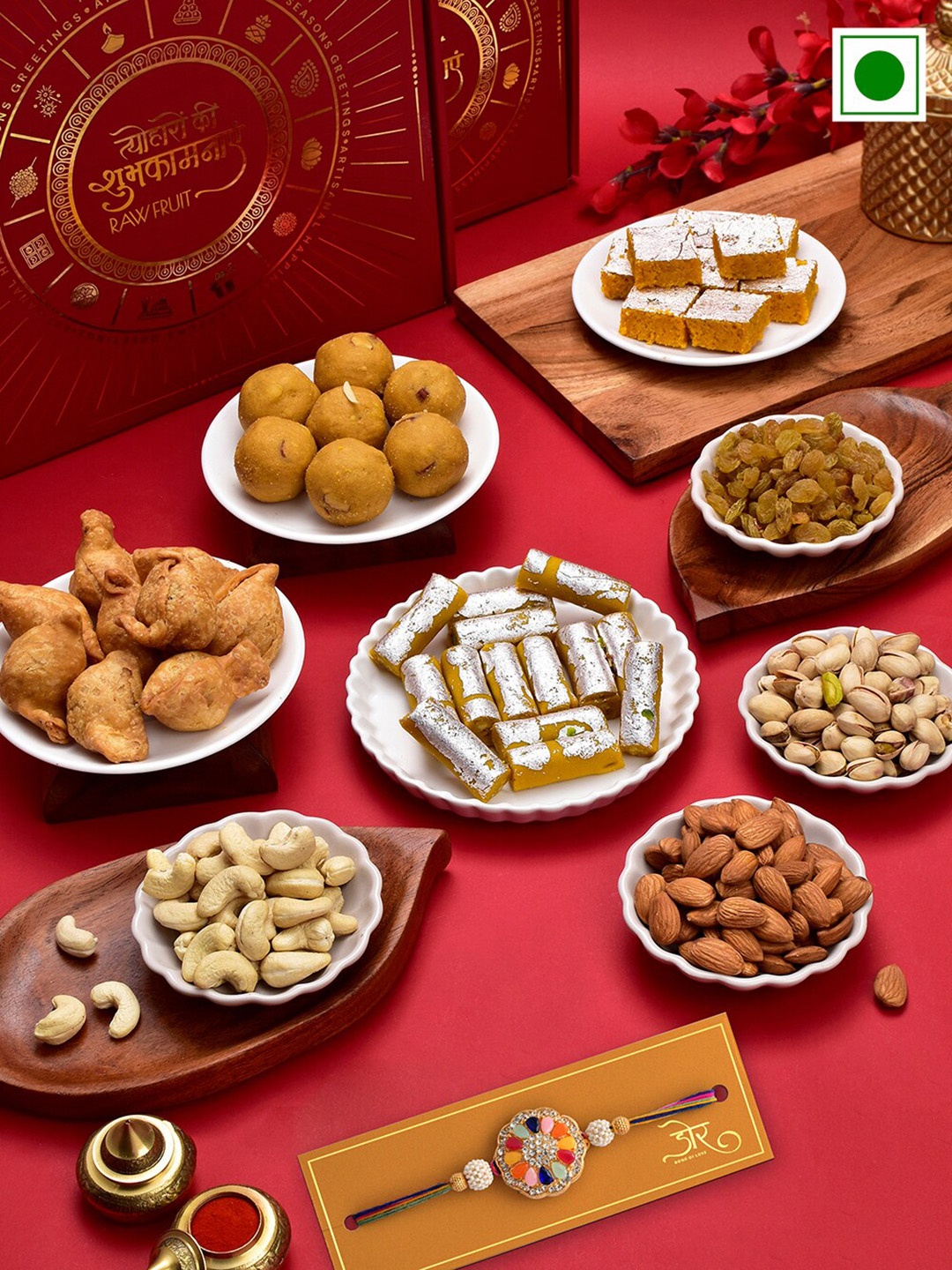 

RawFruit Floral Rakhi With Nuts & Sweets Gift Set, Gold