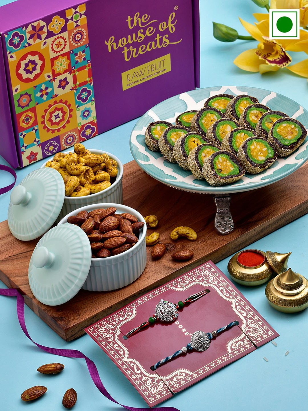 

RawFruit Sweets and Nuts Delight With 2 Rakhis, Silver