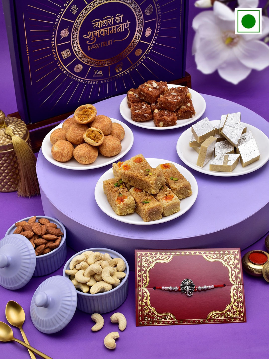 

RawFruit Ganesha Charm Rakhi With Sweets & Nuts Gift Set, Silver