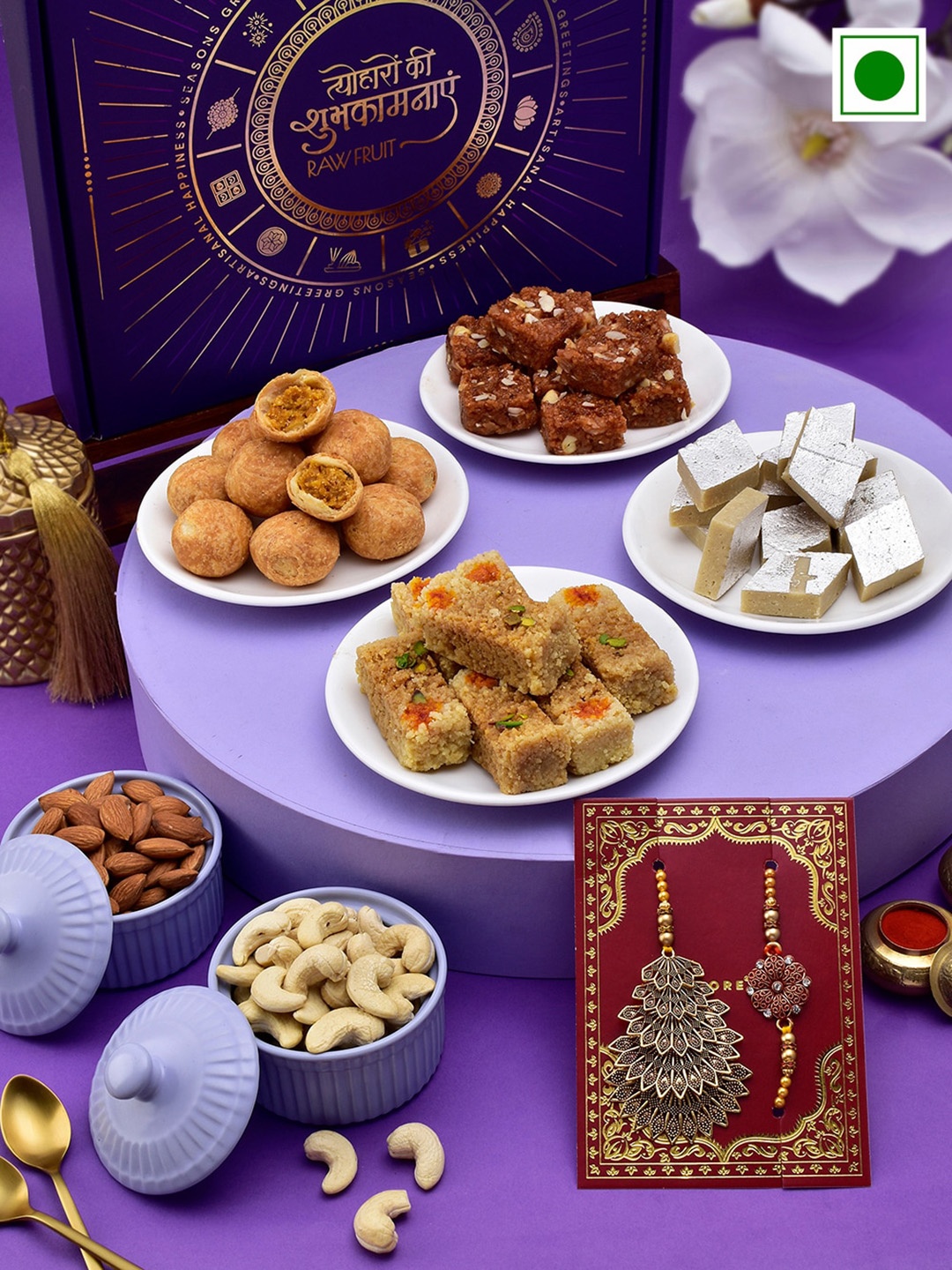 

RawFruit Sweets And Nutty With Bhai Bhabhi Rakhi 1100gms, Red