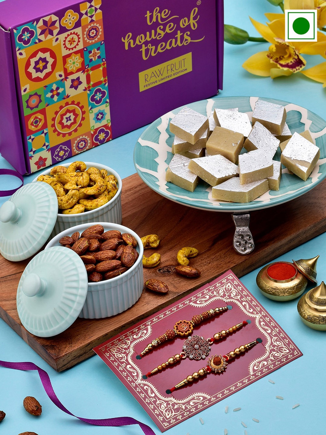 

RawFruit Sweets & Nut Sensation With 3 Rakhis, Purple