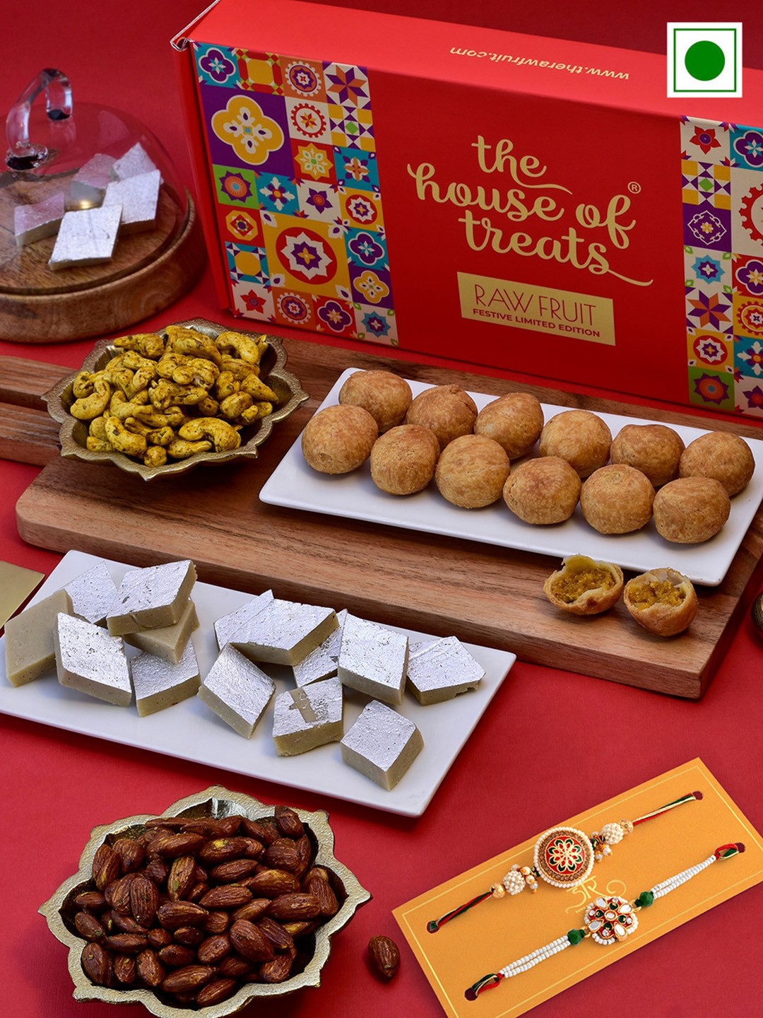 

RawFruit Sweets And Dry Fruit Gift Hamper With 2 Rakhi 650gms, Red