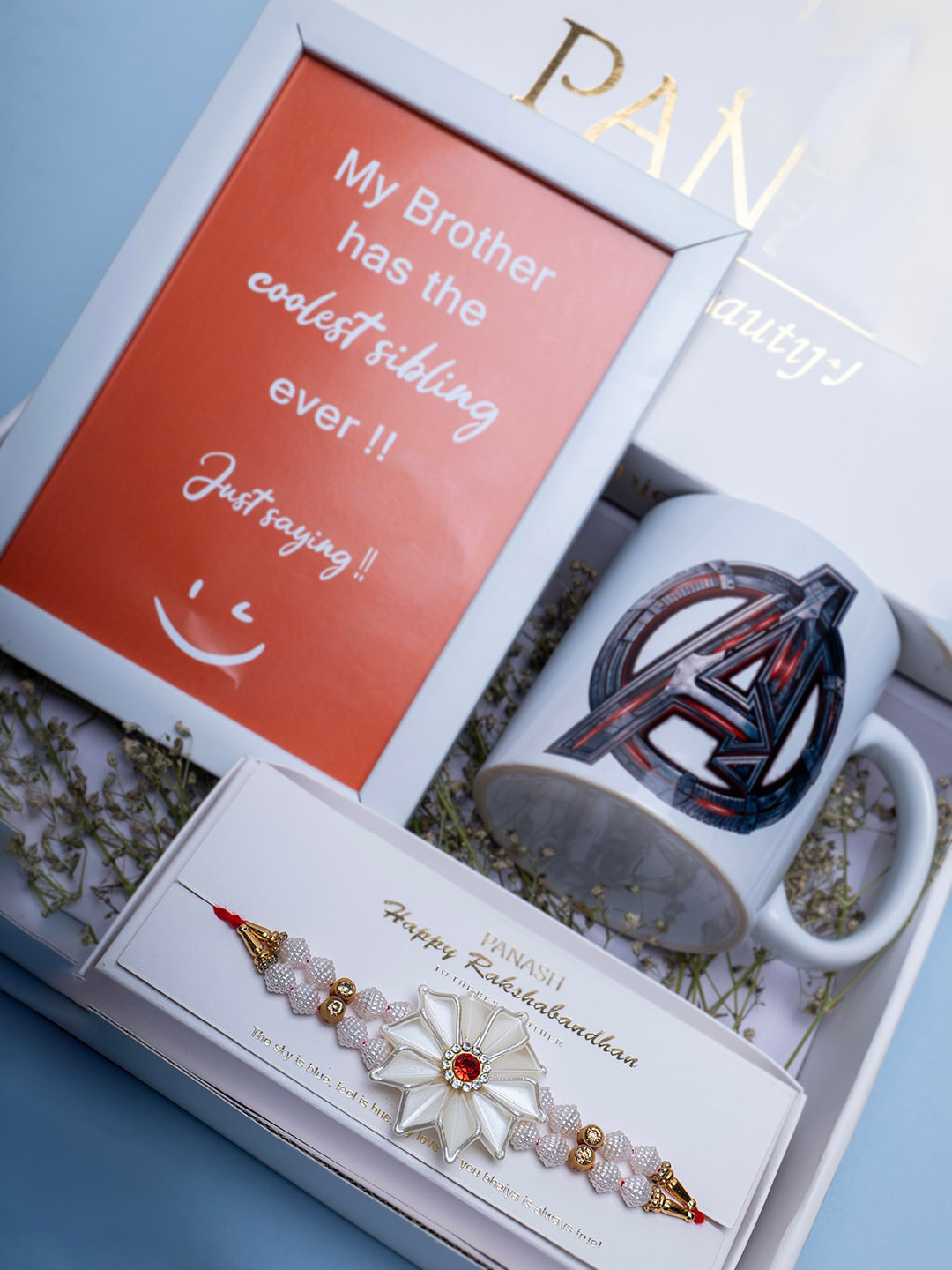 

PANASH Men Gold-Plated Rakhi With Photo Frame & Mug Gift Set