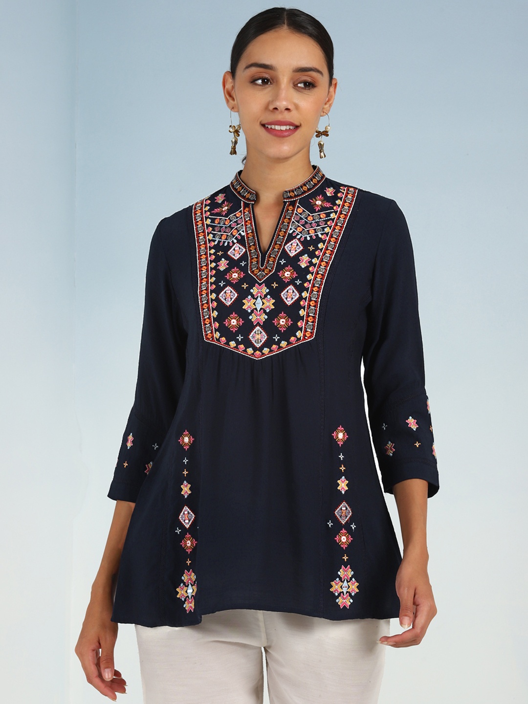

Lakshita Navy Blue & Pink Viscose Rayon Mandarin Collar Embroidered Tunic
