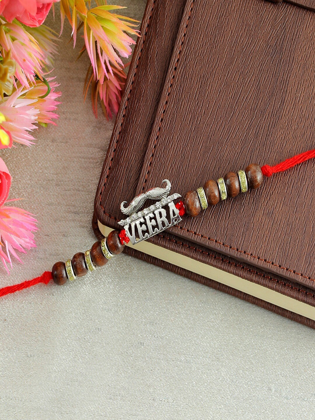 

UNIVERSITY TRENDZ Men Silver-Plated Veera Beaded Rakhi Cum Bracelet