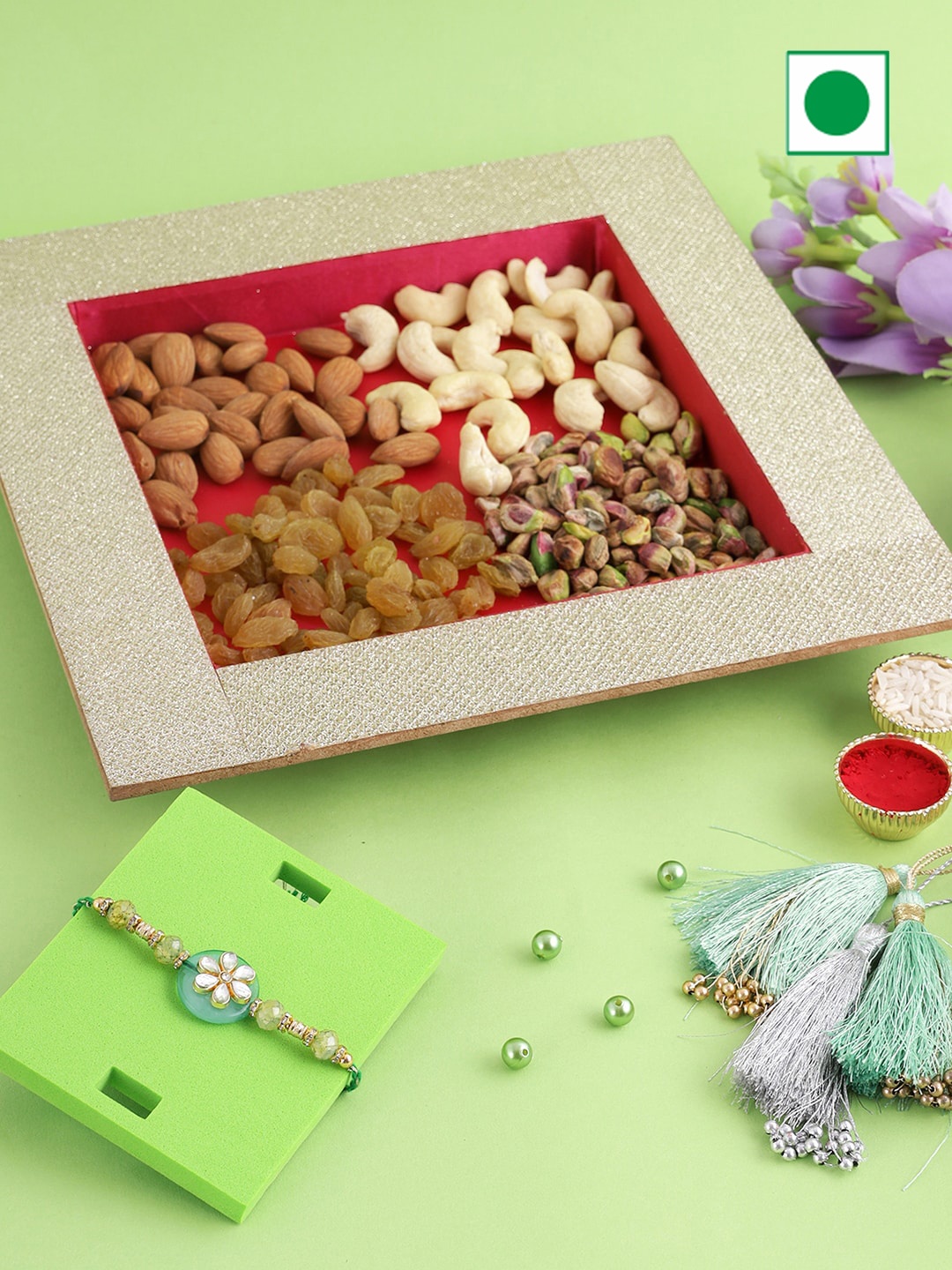 

Aapno Rajasthan Stone Studded and Beaded Rakhis With Dryfruits Gift Set, Green