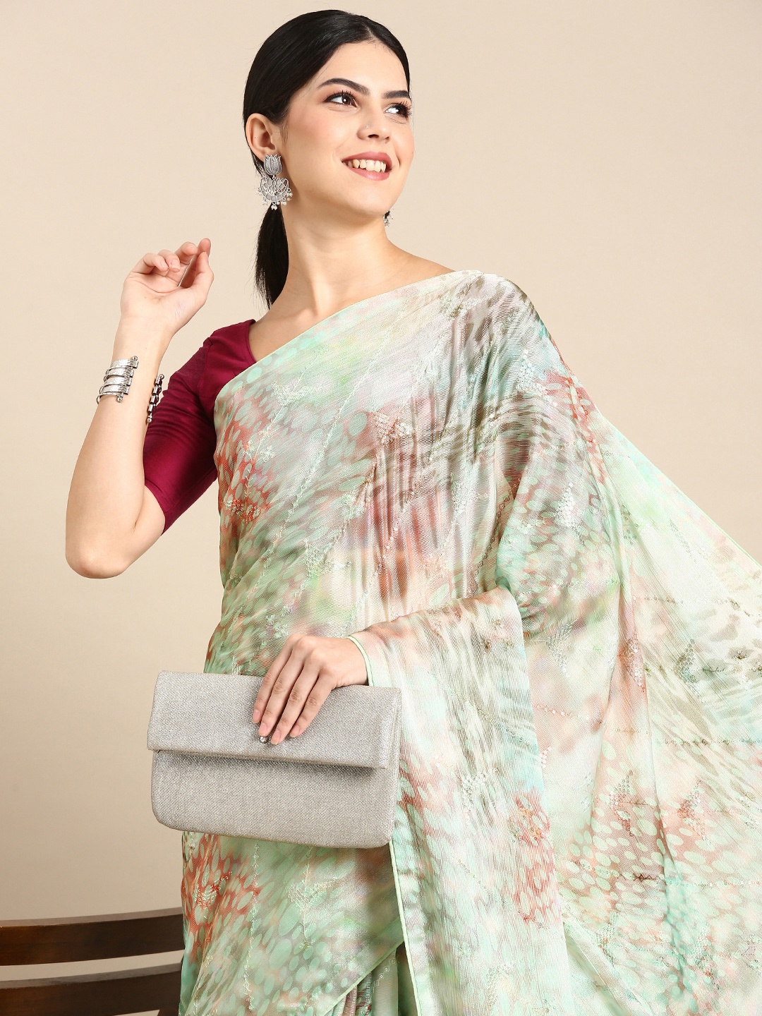 

Kalyan Silks Abstract Printed Sequinned Pure Georgette Saree, Green