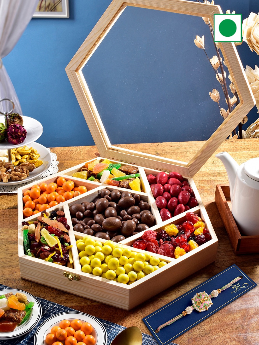 

RawFruit Stone-Studded Rakhis With Royal Assortment Hamper Gifts, Blue