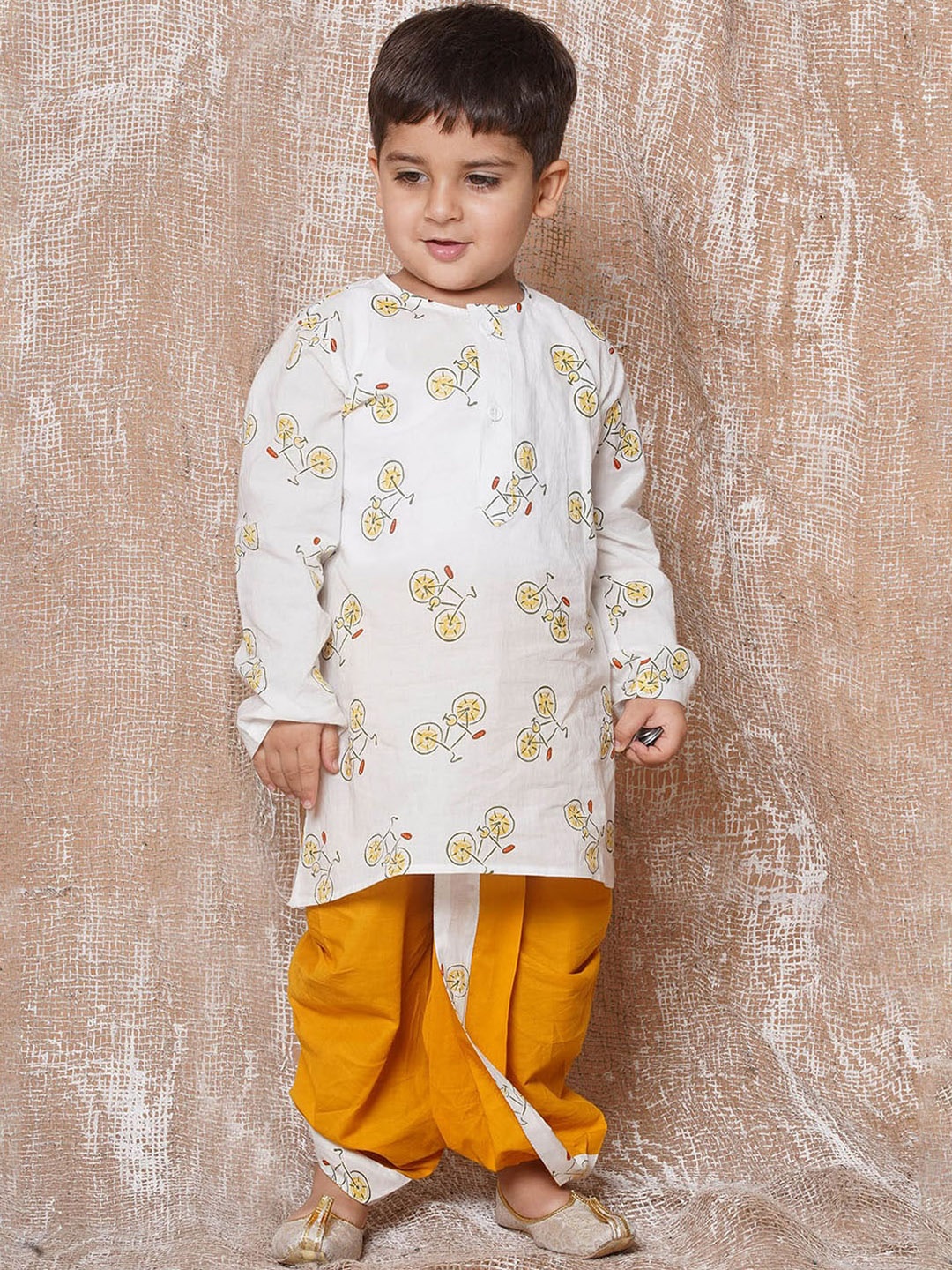 

Aj DEZInES Boys Quirky Printed Pure Cotton Straight Kurta With Dhoti Pants, Yellow