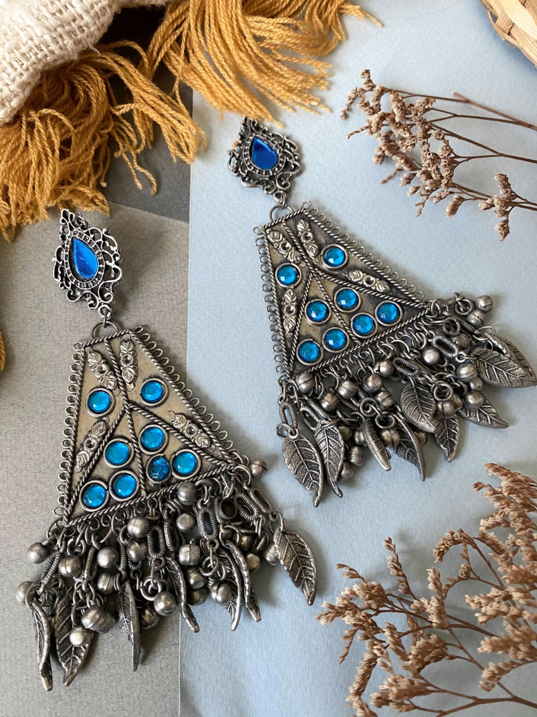 

Pihtara Jewels Silver-Plated Stone Studded Contemporary Oxidised Drop Earrings