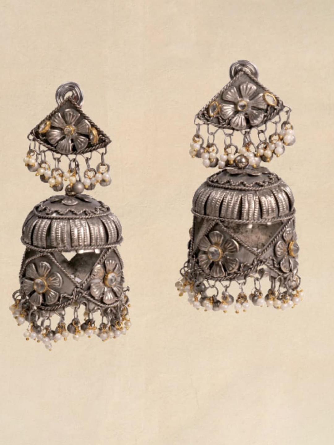

Pihtara Jewels Silver-Plated Dome Shaped Oxidised Jhumkas