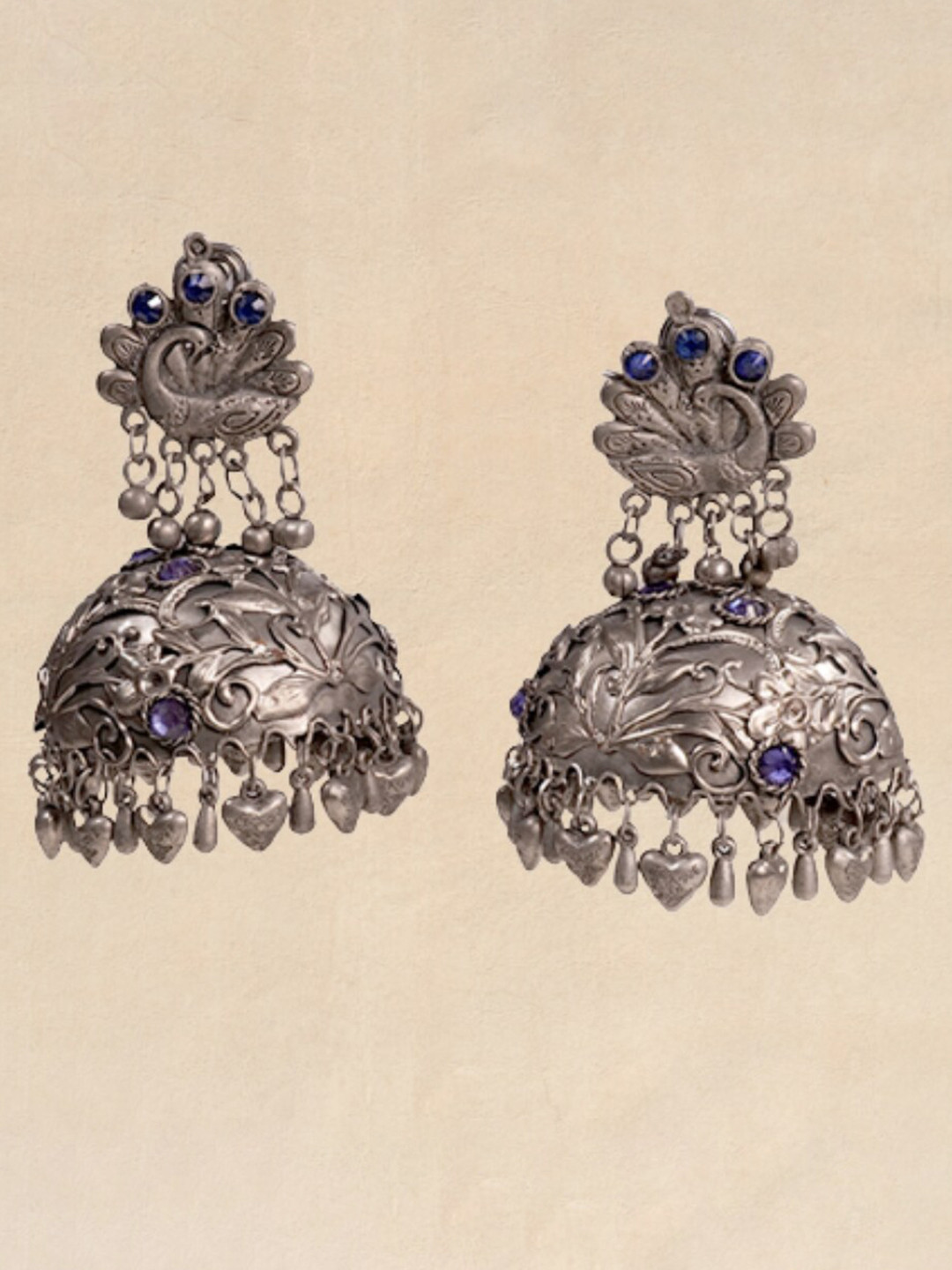 

Pihtara Jewels Silver-Plated Stone-Studded Dome Shaped Oxidised Jhumkas