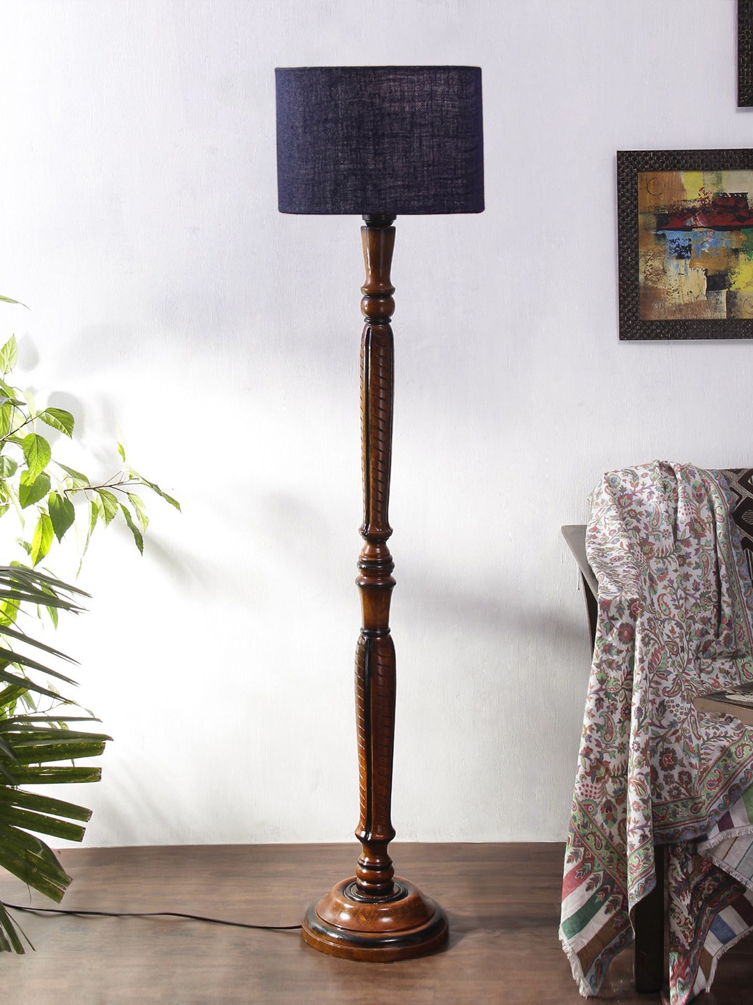 

Devansh Blue Textured Jute & Wooden Floor Lamp