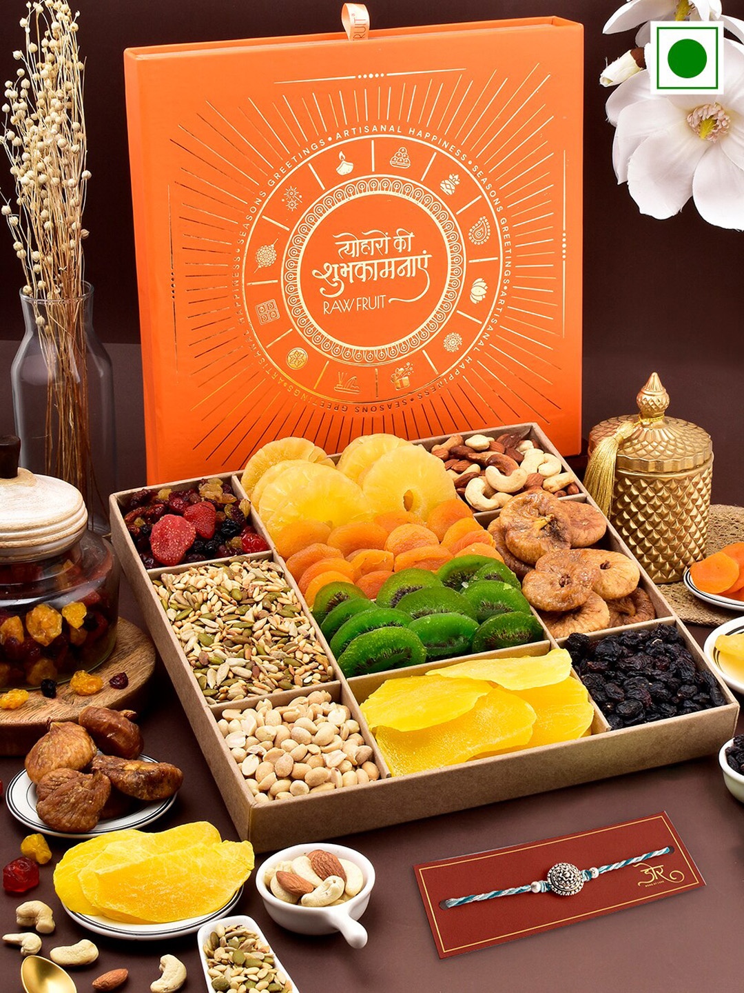 

RawFruit Charmed Rakhi With Roli Chawal & Dryfruits Gift Set, Blue