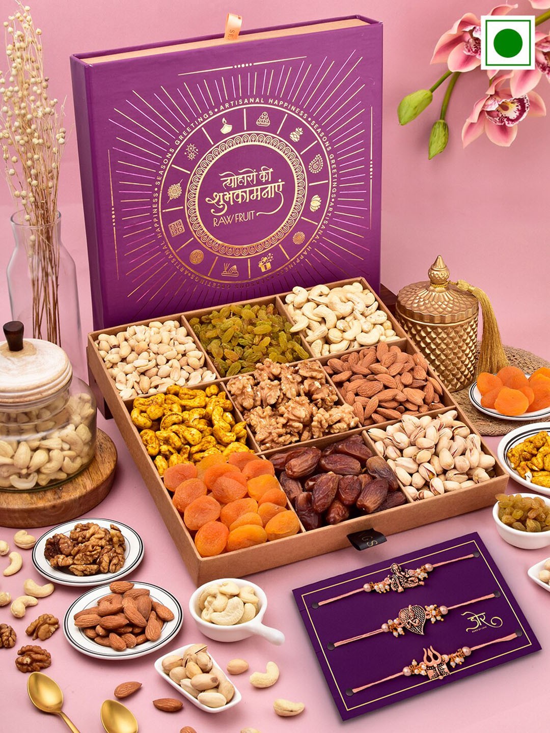 

RawFruit Set Of 3 Charmed Rakhis With Roli Chawal & Dryfruits Gift Set, Rose gold