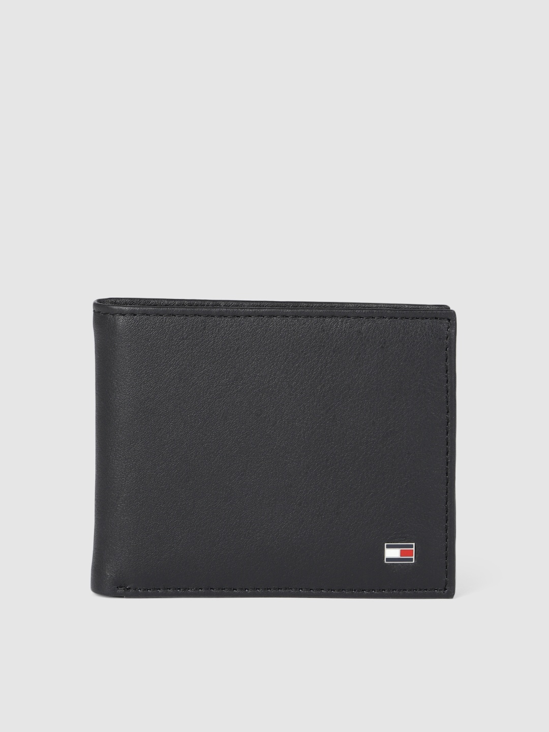 

Tommy Hilfiger Men Black Solid Two Fold Leather Wallet