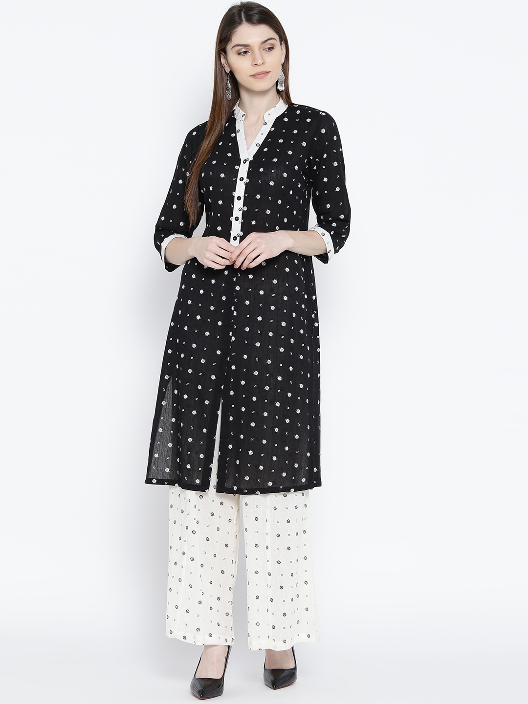 

Ayaany Women Black & Off-White Printed Kurta with Palazzos