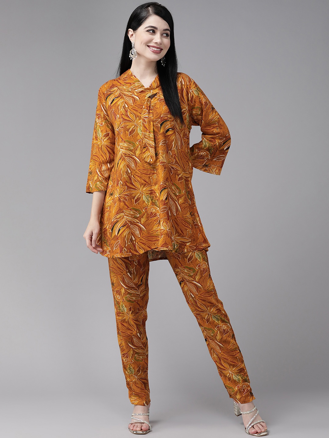 

Aarika Women Floral Printed Regular Pure Cotton Kurta with Trousers, Mustard