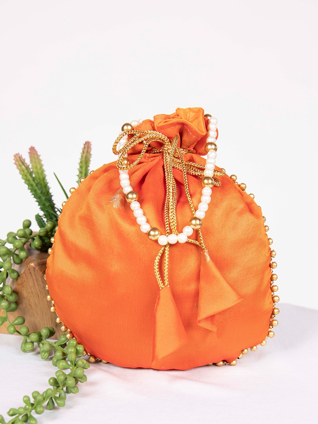 

LOOKNBOOK ART Embellished Tasselled Potli Clutch, Orange