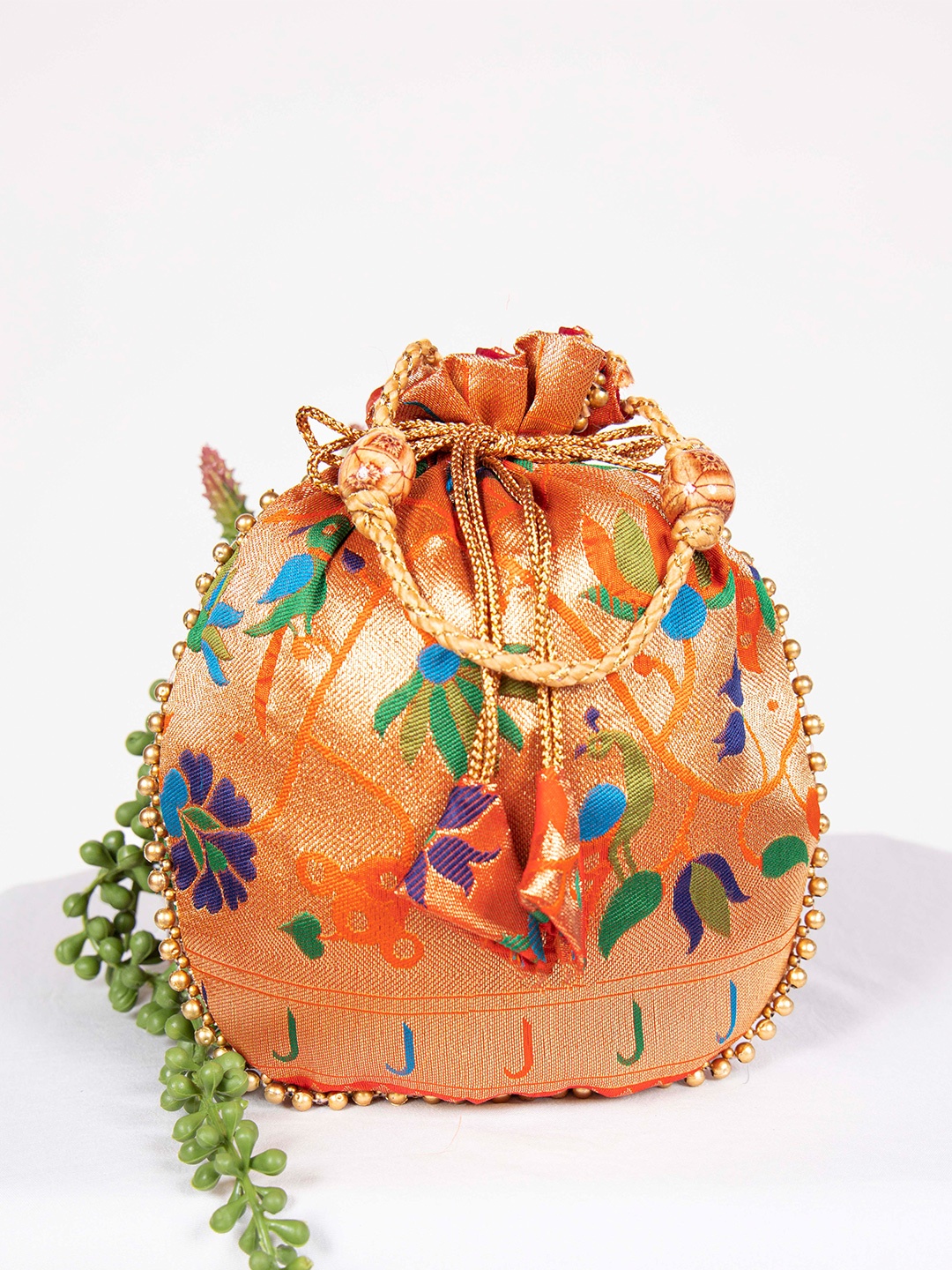 

LOOKNBOOK ART Embellished Tasselled Potli Clutch, Orange