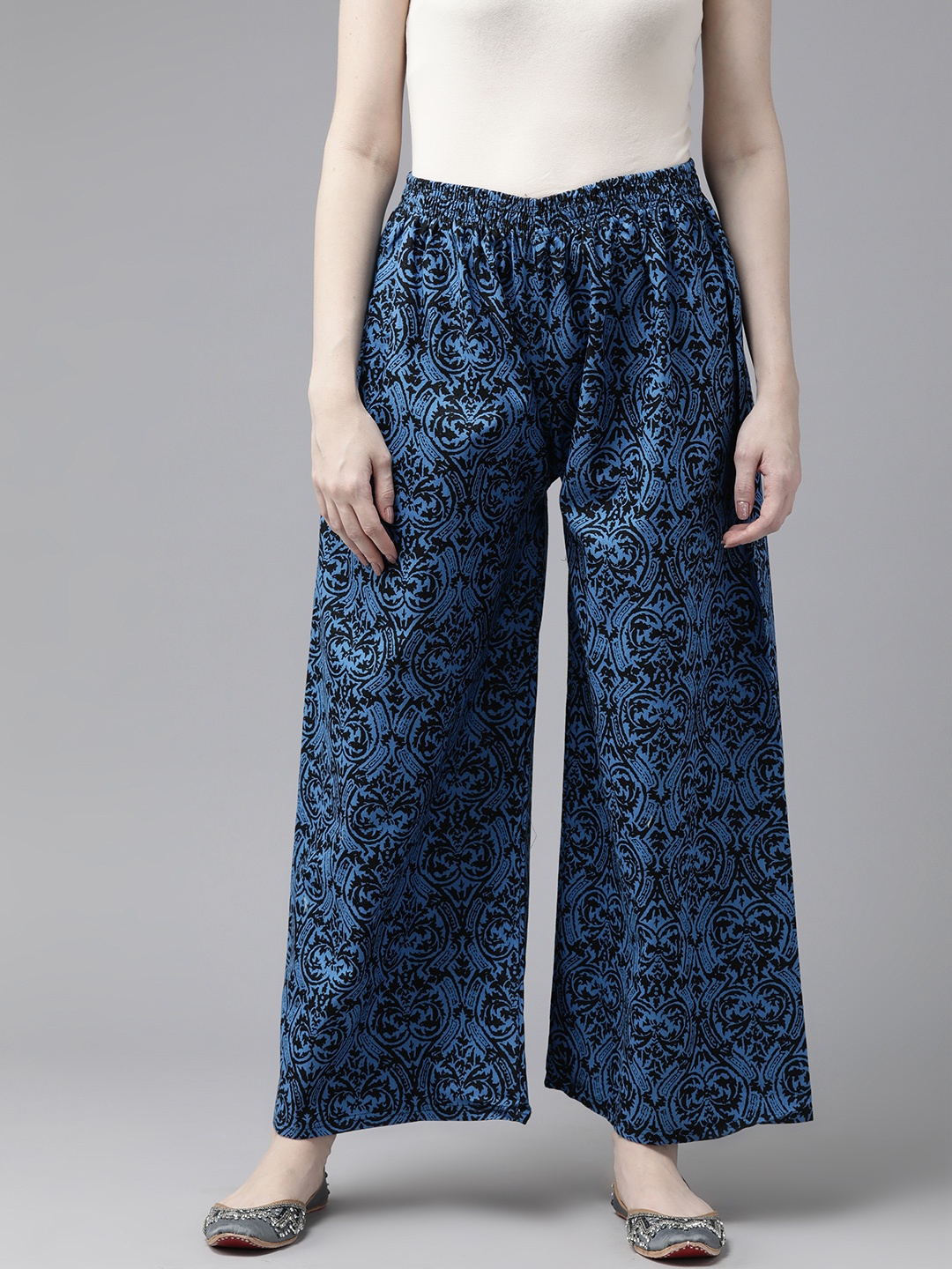 

Aarika Women Floral Printed Flared Cotton Palazzos, Black