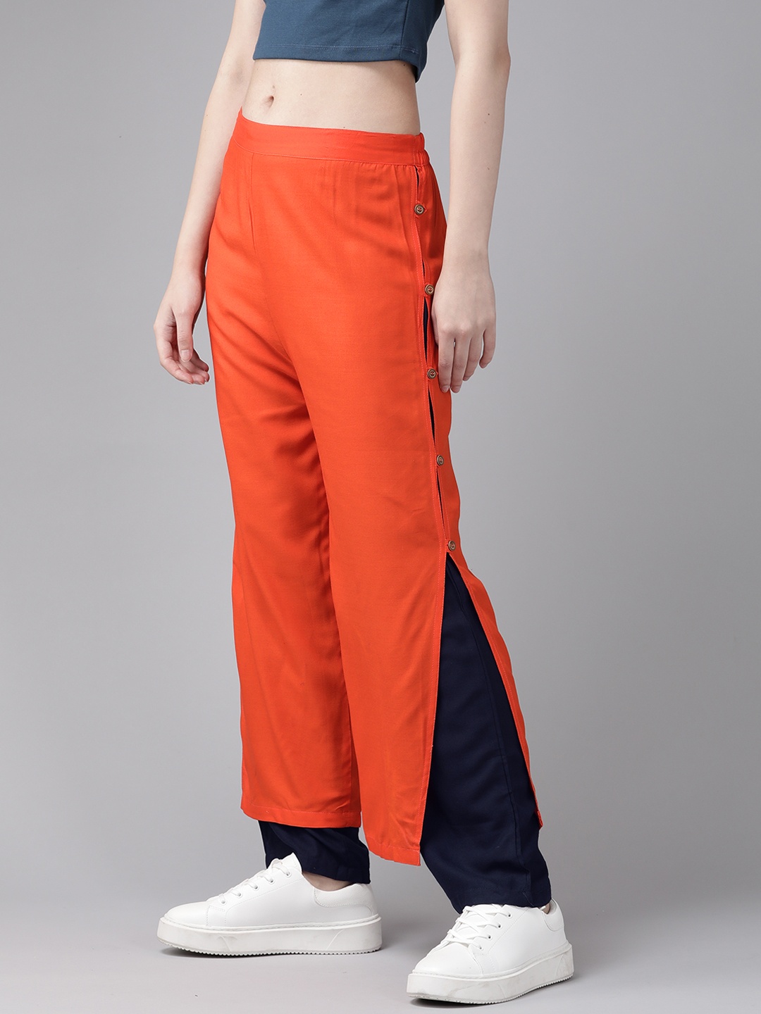 

Aarika Women Colourblocked Flared Cotton Palazzos, Orange