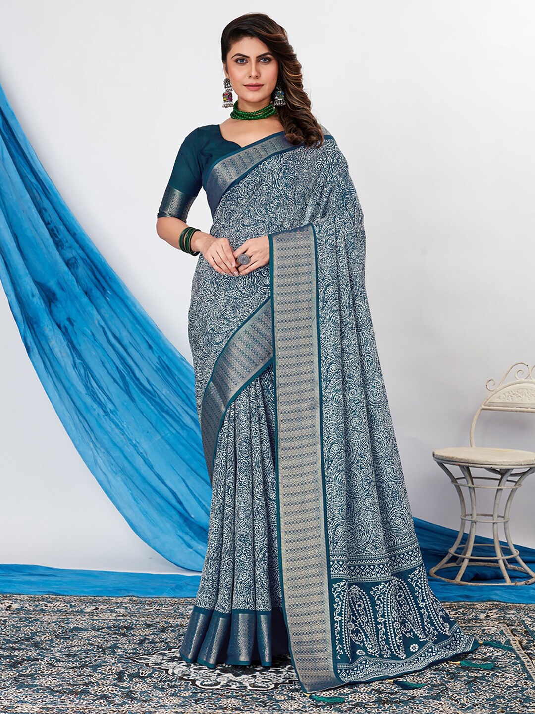 

Saree mall Teal & White Ethnic Motifs Printed Zari Sungudi Sarees