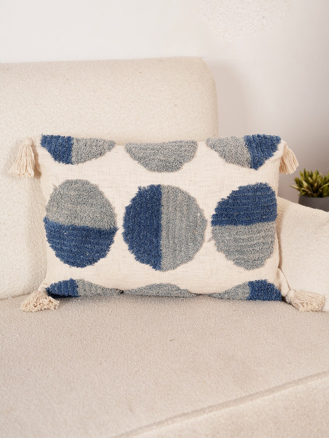 

Art Avenue Cream-Coloured & Blue Self Design Cotton Rectangle Cushion Cover