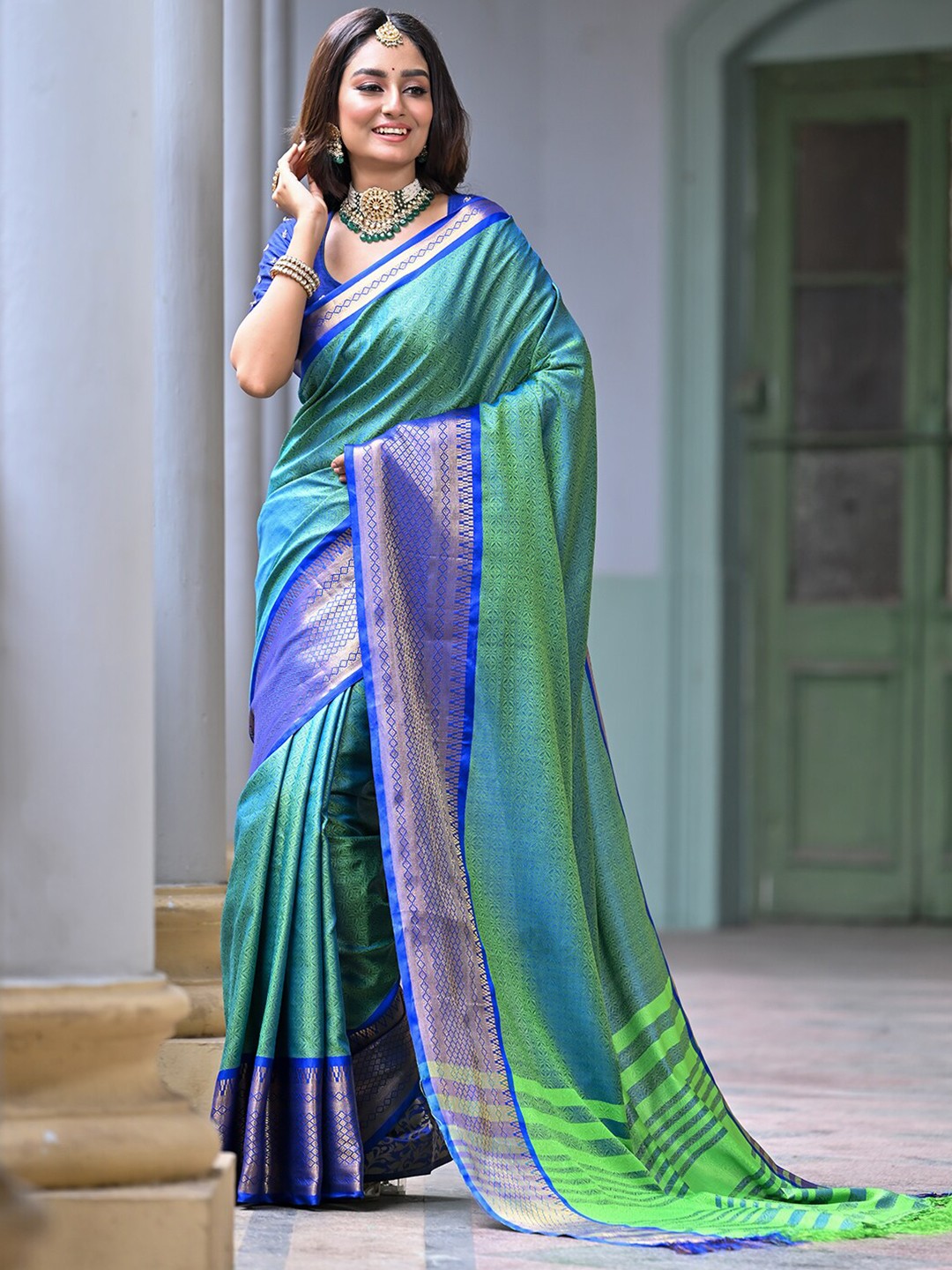 

Anouk Green & Blue Ethnic Motifs Zari Detailed Art Silk Kanjeevaram Saree