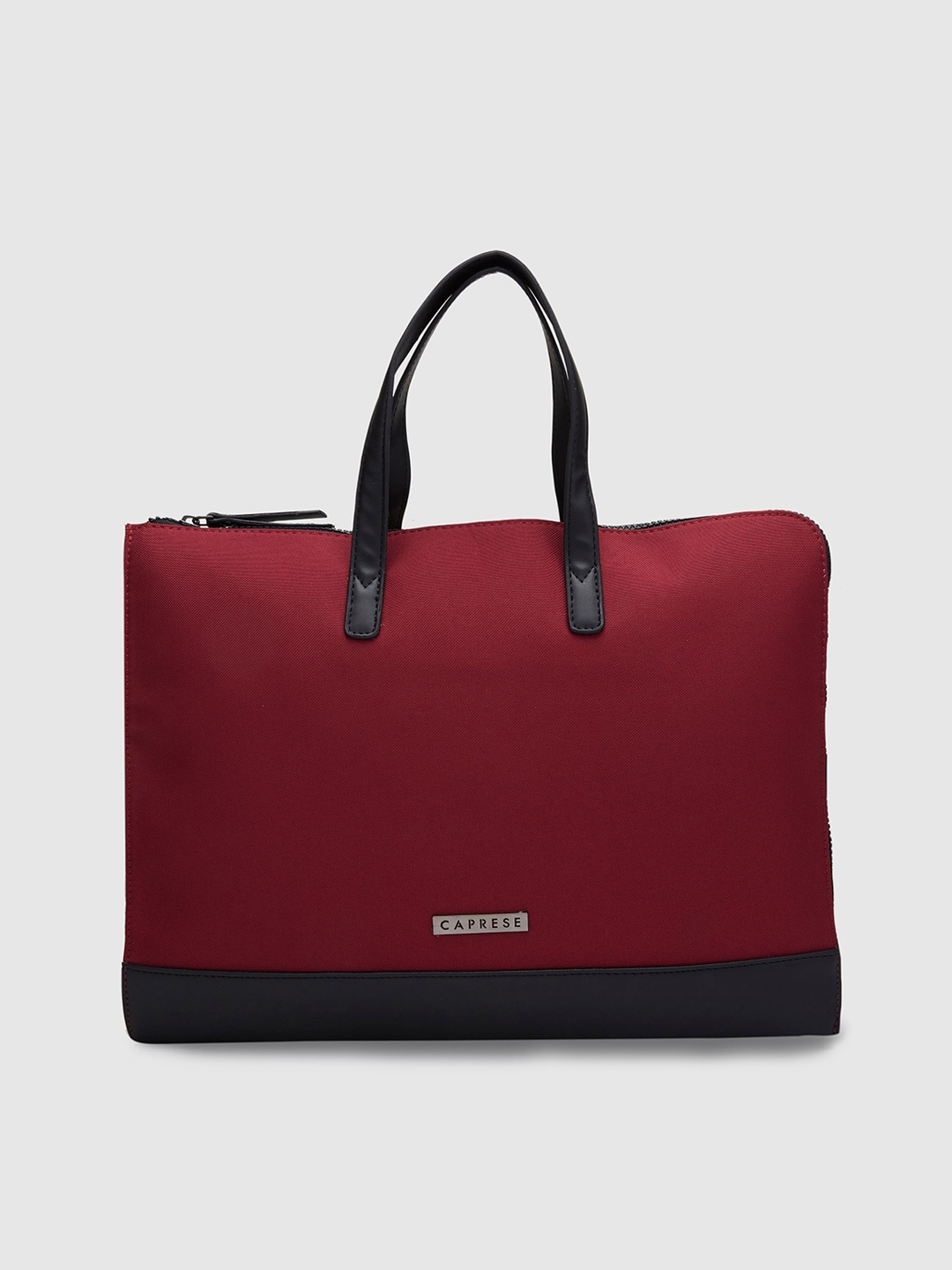 

Caprese Women Solid Laptop Bag, Red