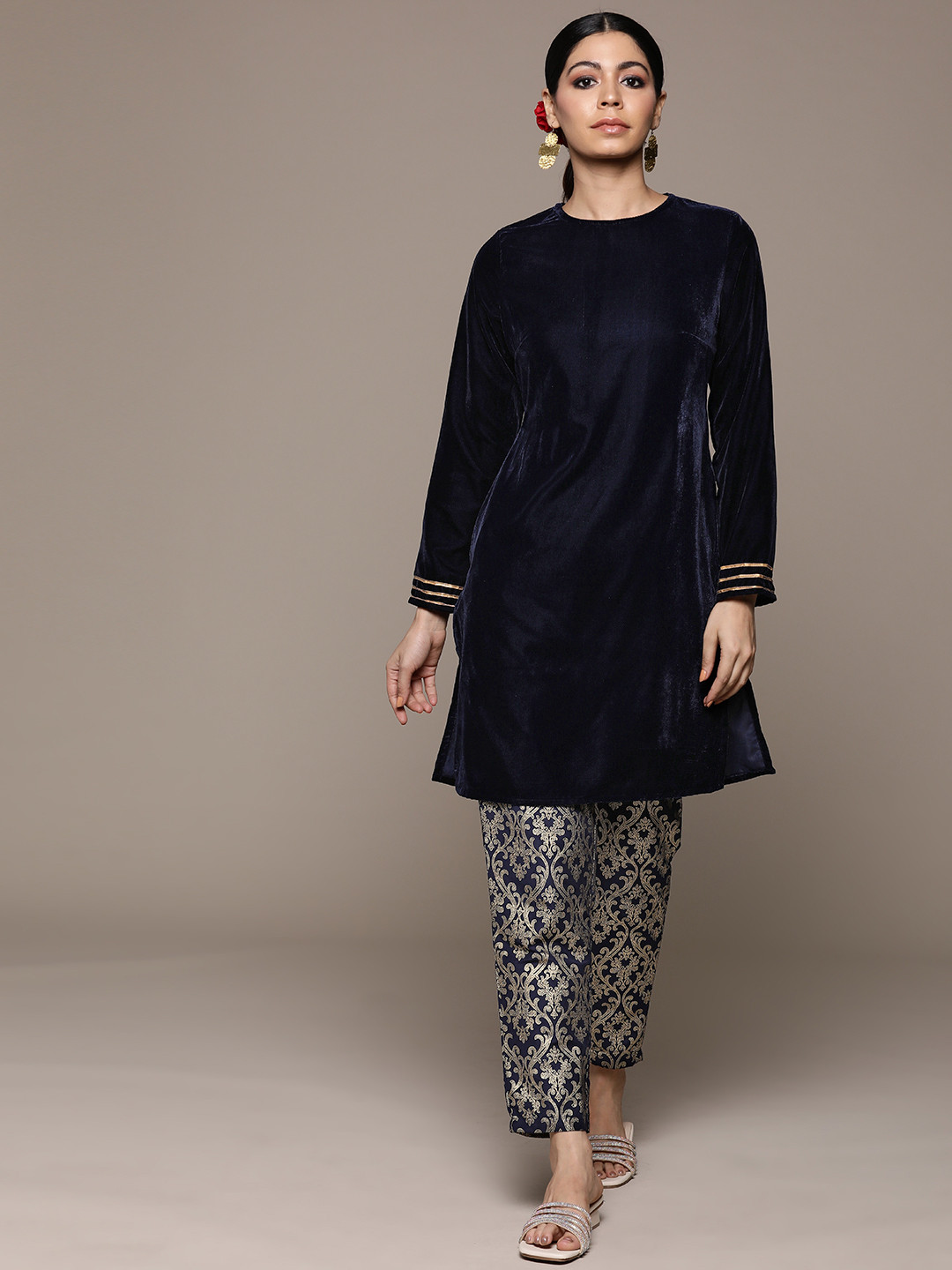 

Moda Rapido Ethnic Motifs Gotta Patti Detailed Velvet Finish Kurti with Printed Trousers, Navy blue