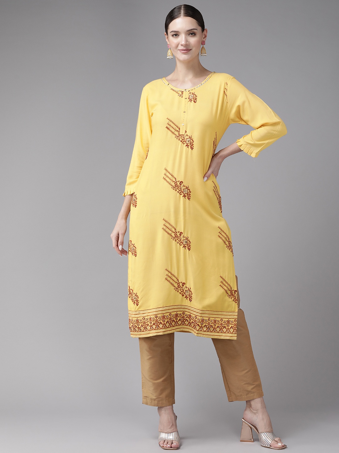 

Aarika Women Yellow Floral Embroidered Gotta Patti Kurta