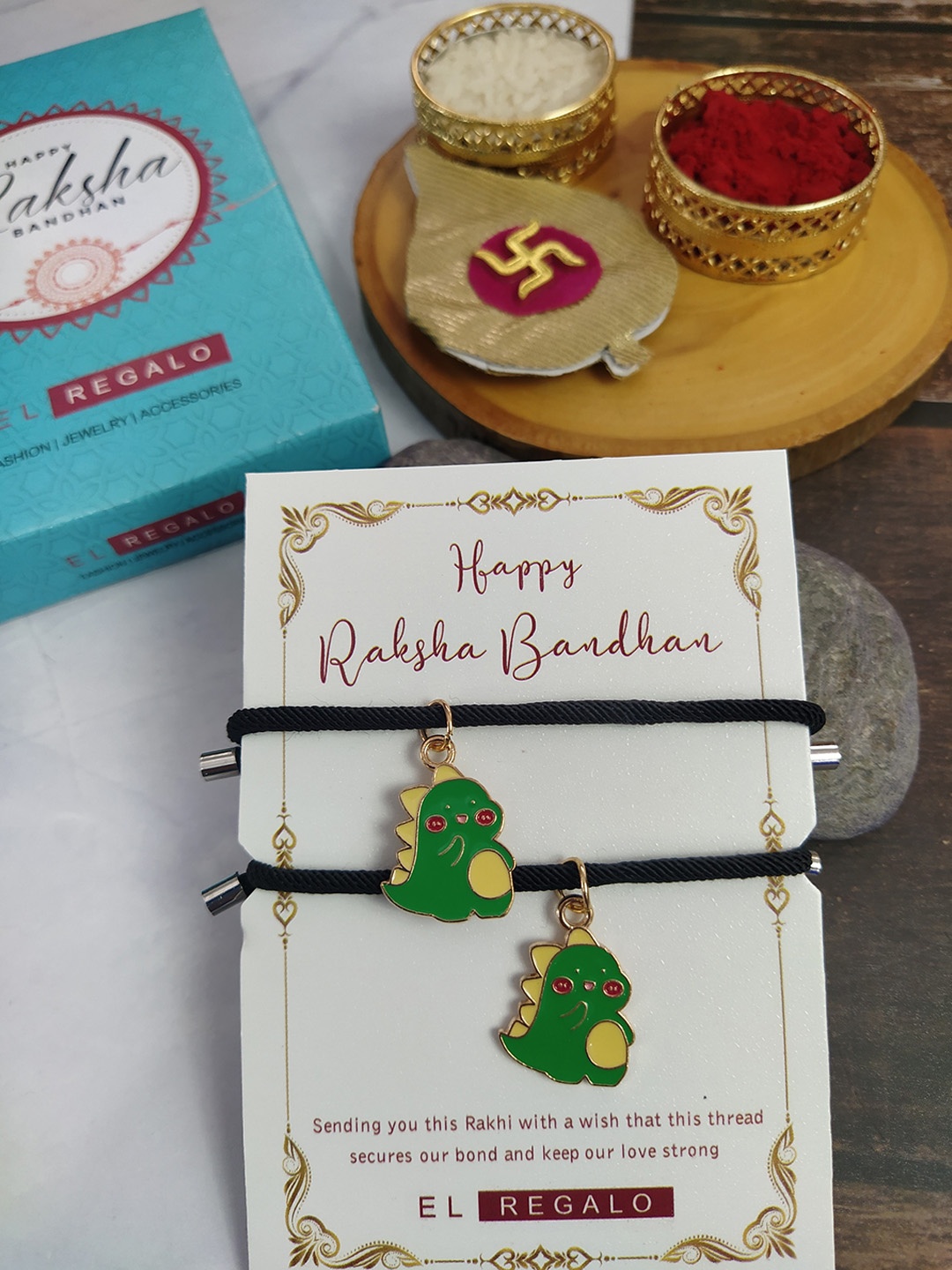 

EL REGALO Set Of 2 Dino Charm Rakhis With Roli Chawal, Green