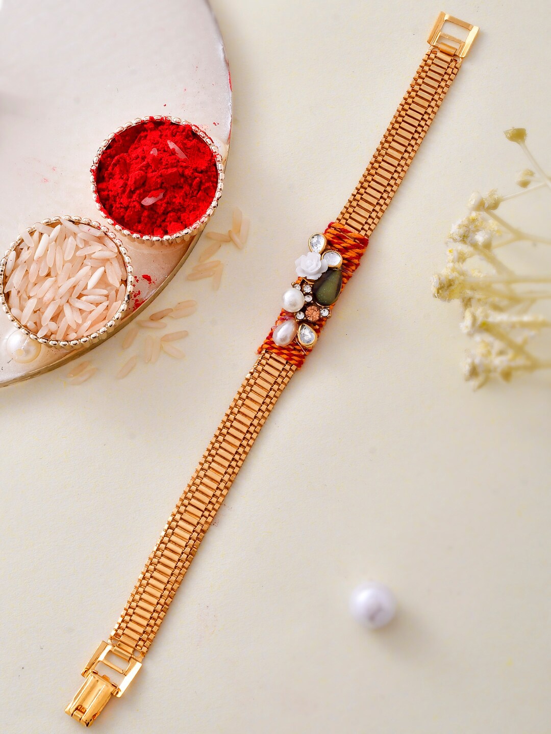 

Aapno Rajasthan Unisex Embellished Bracelet Rakhi With Roli Chawal & Greeting Card, Gold