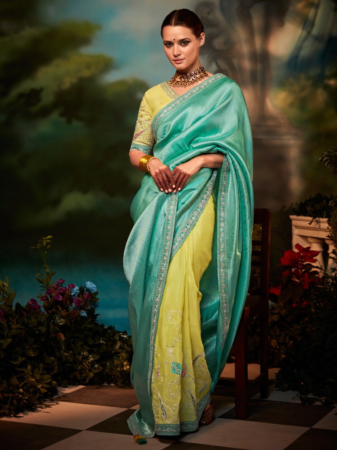 

Mitera Yellow & Green Ethnic Motifs Embroidered Silk Blend Half and Half Saree