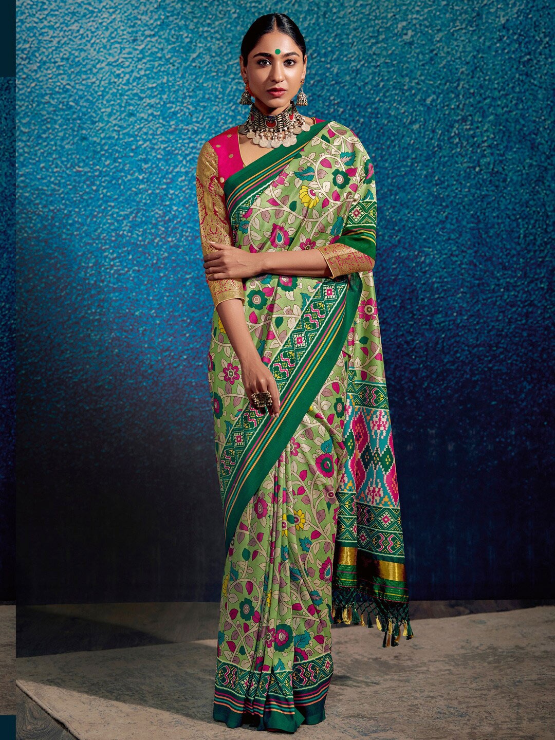 

Mitera Green & Red Floral Printed Silk Blend Ikat Saree