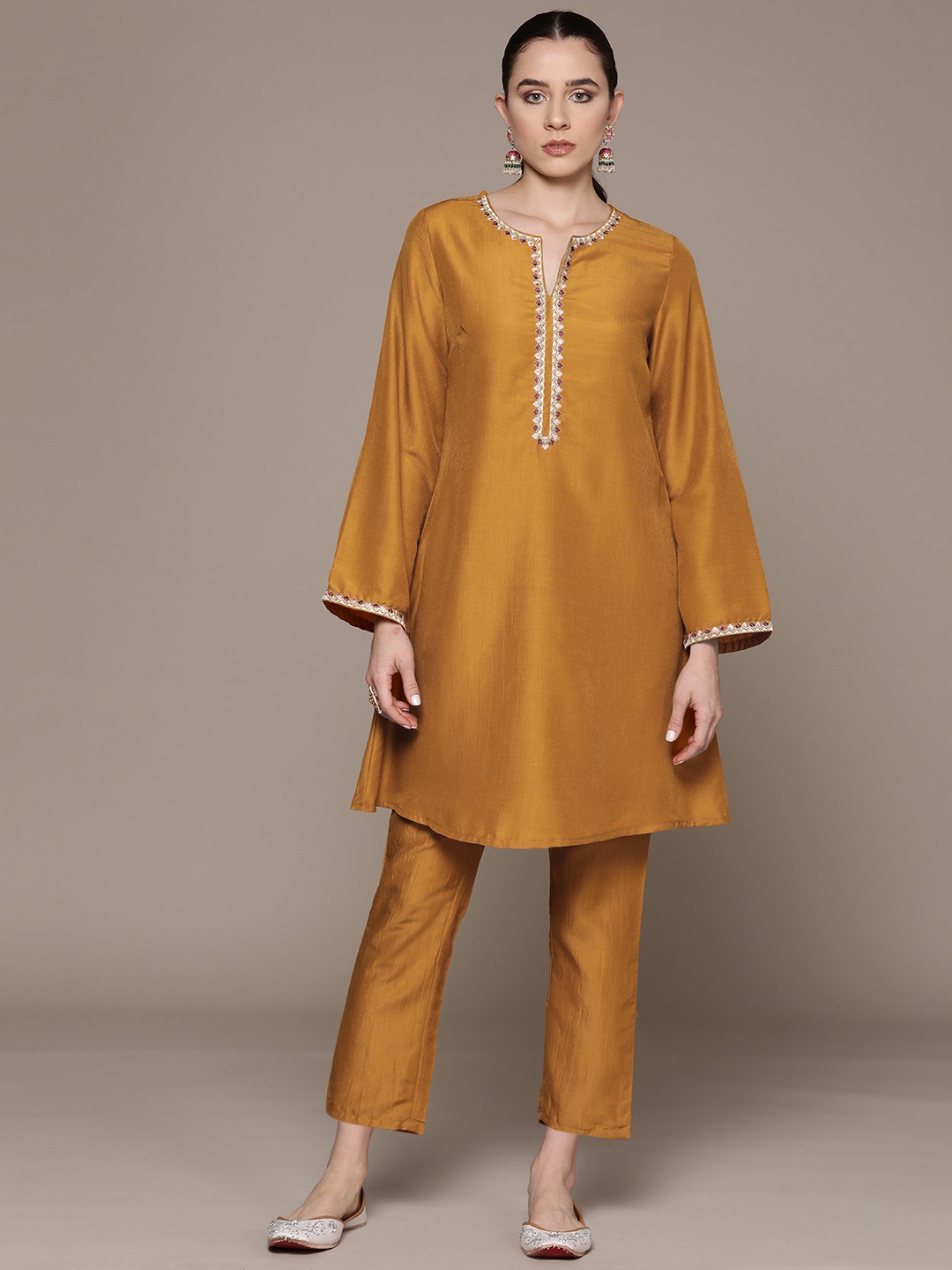 

Moda Rapido Ethnic Motifs Zari Embroidered A-Line Kurta with Trousers, Mustard