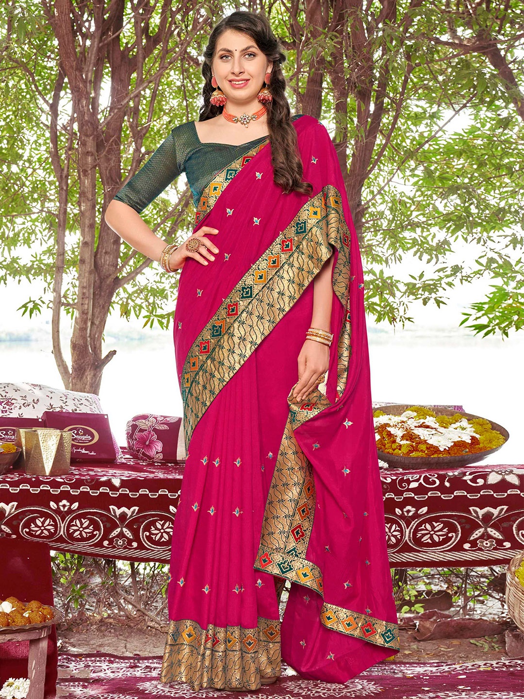 

Mitera Pink & Green Ethnic Motifs Embroidered Saree