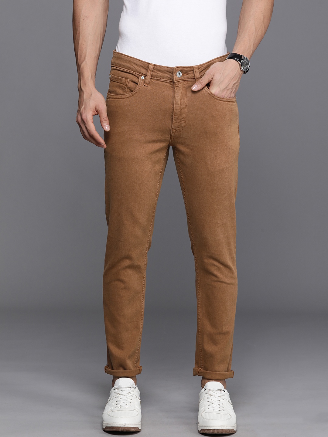 

Louis Philippe Jeans Men Smart Low-Rise Stretchable Jeans, Brown