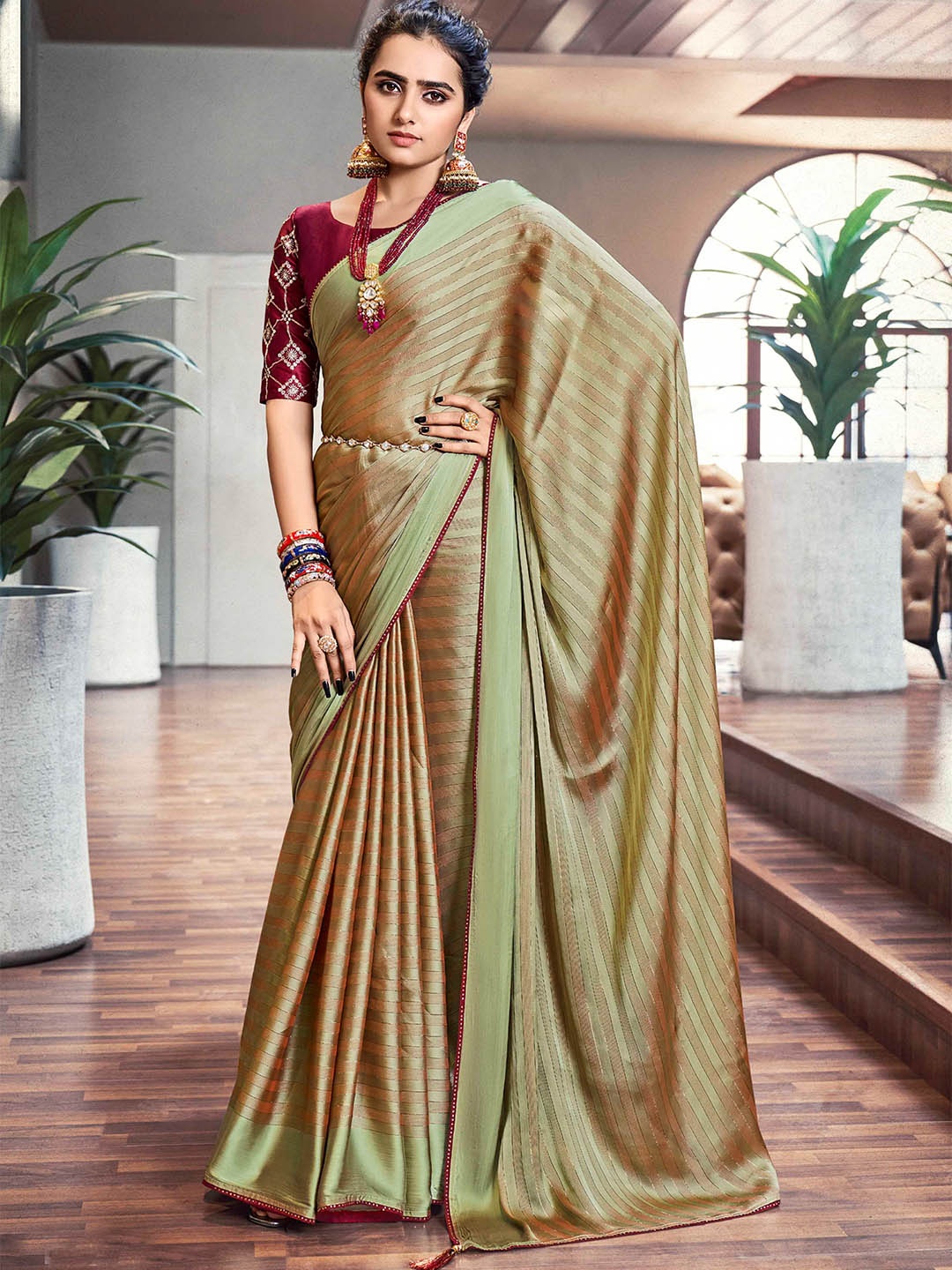 

Mitera Green & Gold-Toned Striped Satin Saree