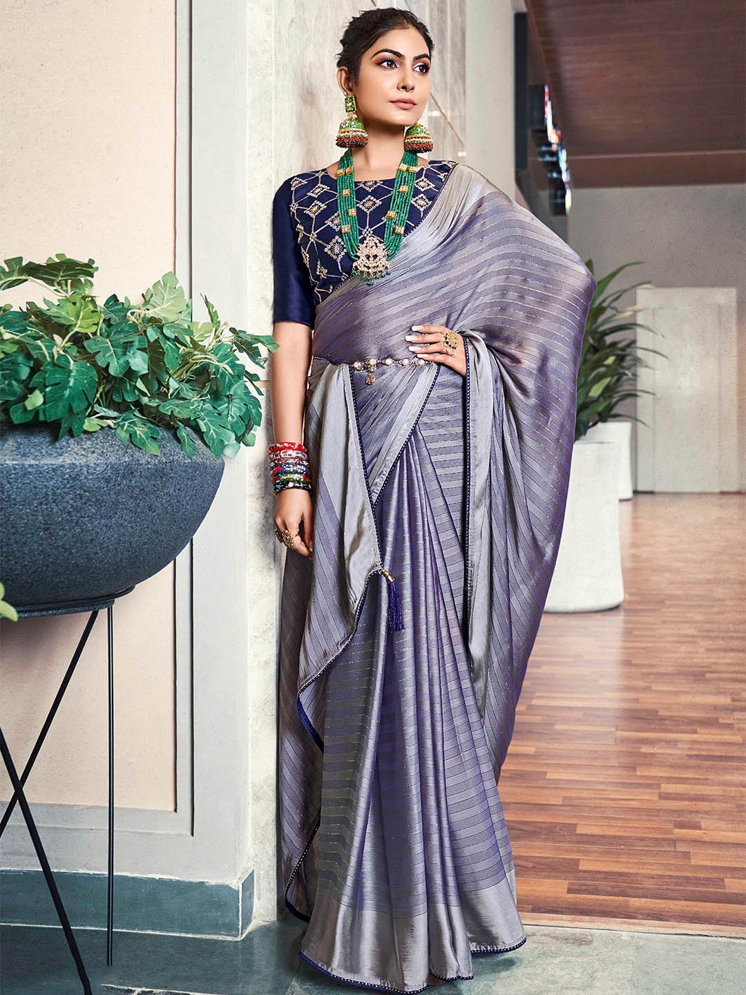 

Mitera Navy Blue Striped Satin Saree