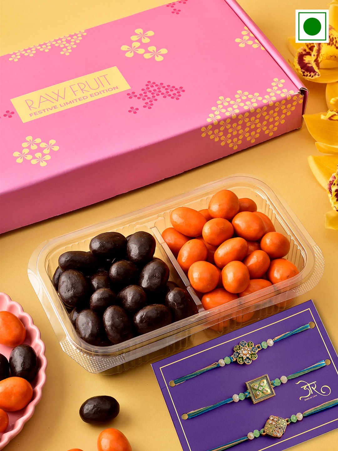 

RawFruit Orange Dark Chocolate Dragees With 3 Rakhis-160 gms Each, Gold