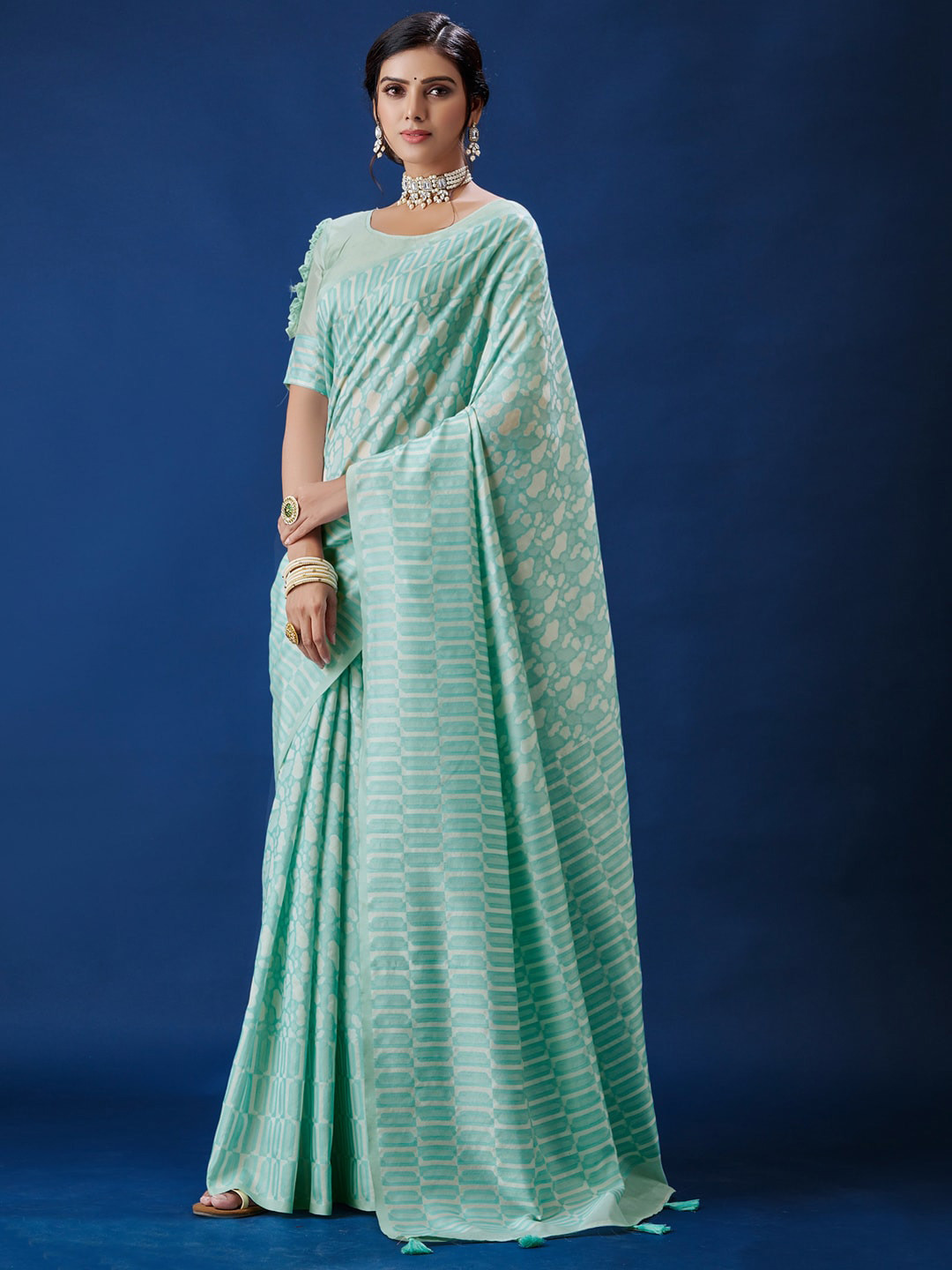 

Sangria Blue Abstract Woven Design Saree