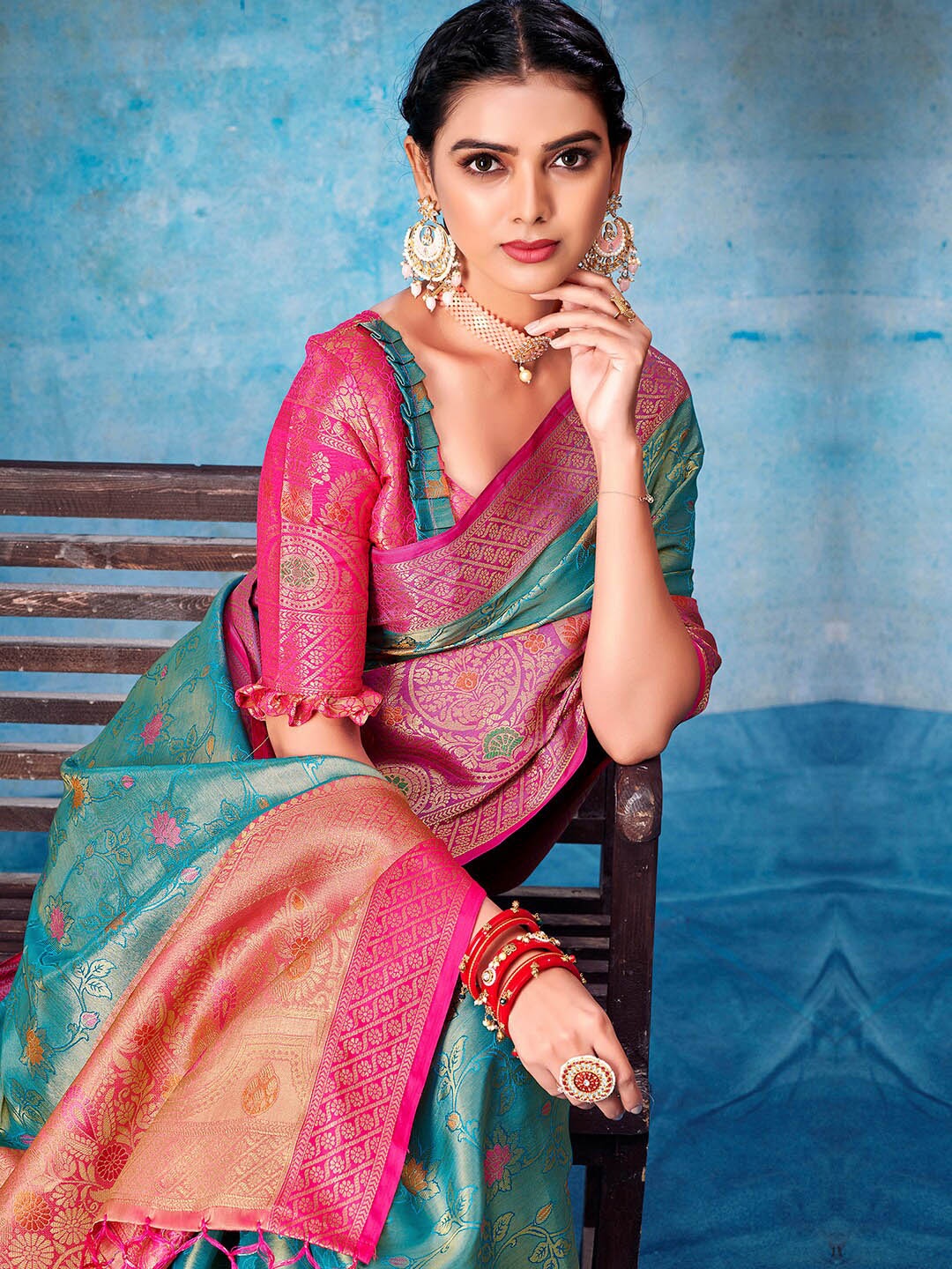 

Sangria Teal Floral Woven Design Zari Saree