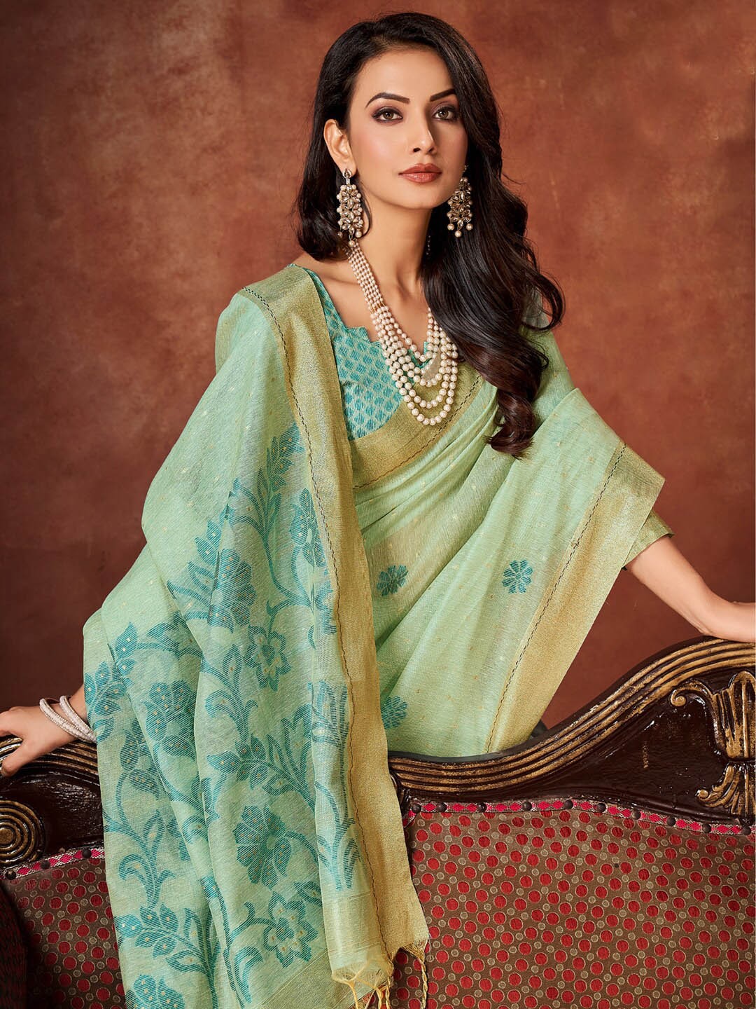 

Sangria Sea Green Floral Woven Design Zari Saree